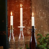 Eleganti portacandele e lanterne a tema natalizio